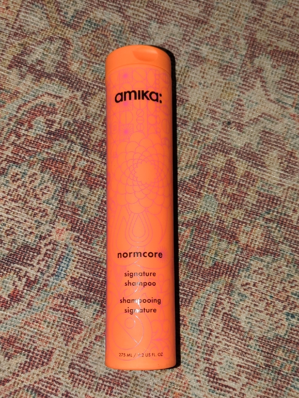 amika Normcore Signature Shampoo - Neon Orange Bottle
